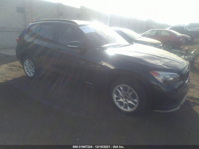 2015 BMW X1, VIN: WBAVM1C56FV315501