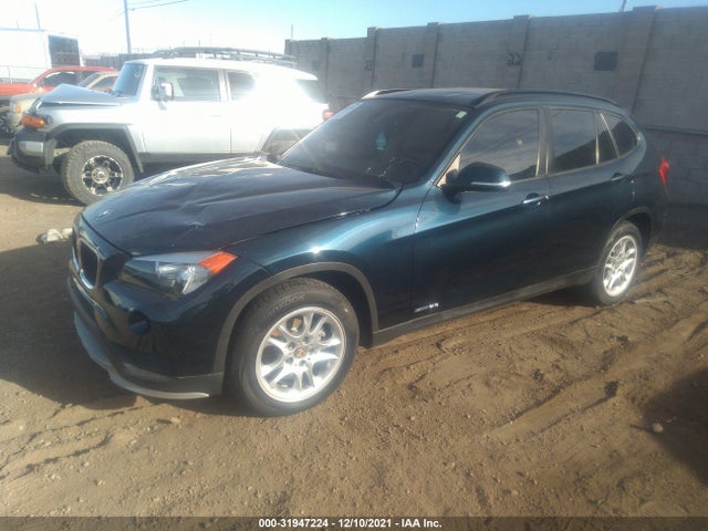2015 BMW X1, VIN: WBAVM1C56FV315501