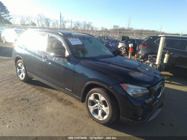 2014 BMW X1, VIN: WBAVM1C5XEVW49724