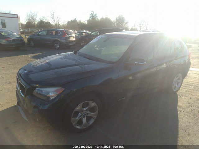 2014 BMW X1, VIN: WBAVM1C5XEVW49724