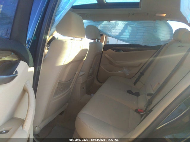 2014 BMW X1, VIN: WBAVM1C5XEVW49724