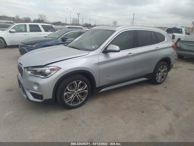 2016 BMW X1, VIN: WBXHT3Z34G4A50904