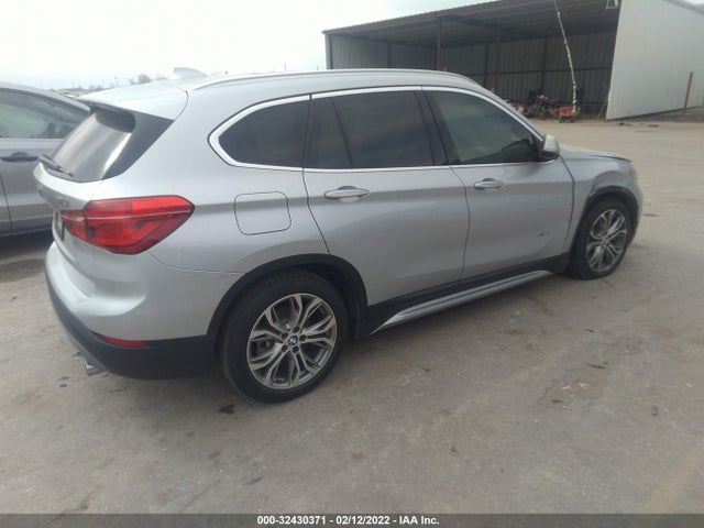 2016 BMW X1, VIN: WBXHT3Z34G4A50904