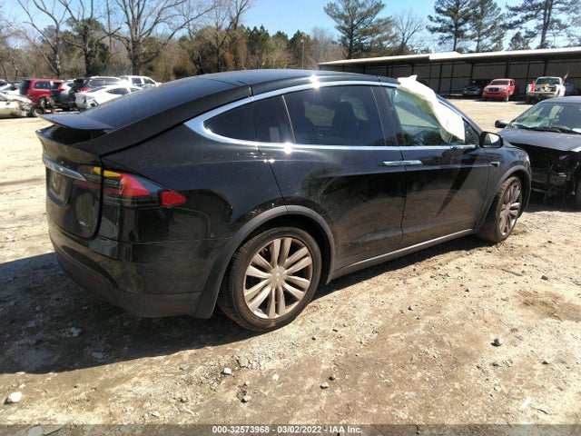 2016 Tesla Model X, VIN: 5YJXCDE28GF026011