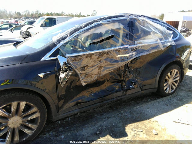 2016 Tesla Model X, VIN: 5YJXCDE28GF026011
