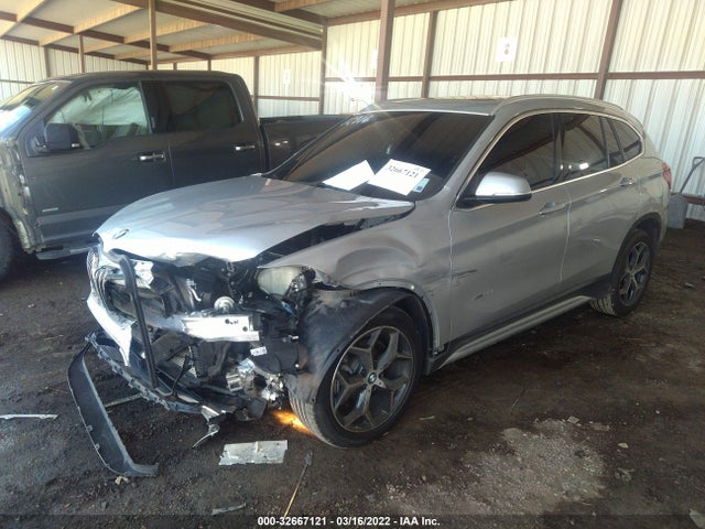 2018 BMW X1, VIN: WBXHT3C31J5K25634