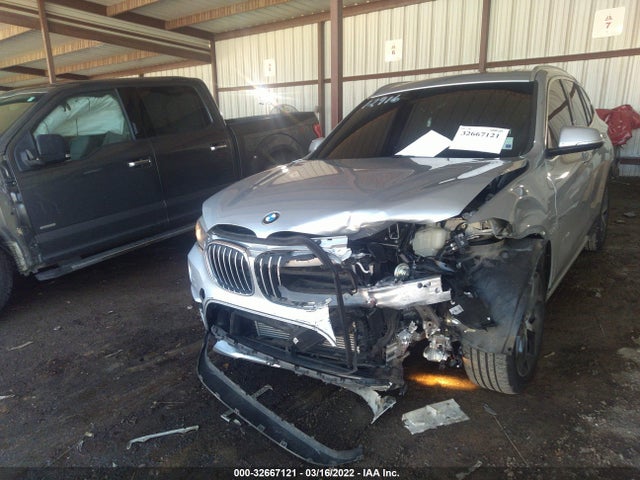 2018 BMW X1, VIN: WBXHT3C31J5K25634