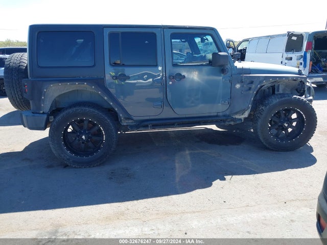 1C4HJWDG3EL144559 Jeep Wrangler Unlimited Sport