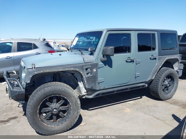 1C4HJWDG3EL144559 Jeep Wrangler Unlimited Sport
