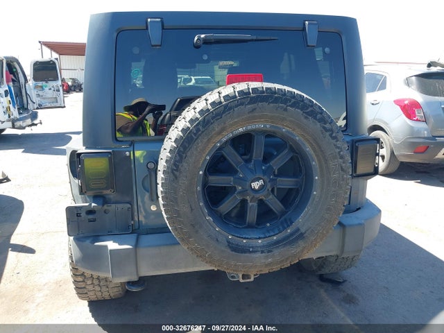 1C4HJWDG3EL144559 Jeep Wrangler Unlimited Sport