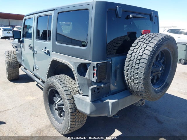 1C4HJWDG3EL144559 Jeep Wrangler Unlimited Sport