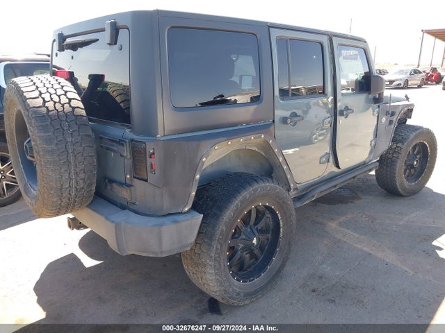 1C4HJWDG3EL144559 Jeep Wrangler Unlimited Sport