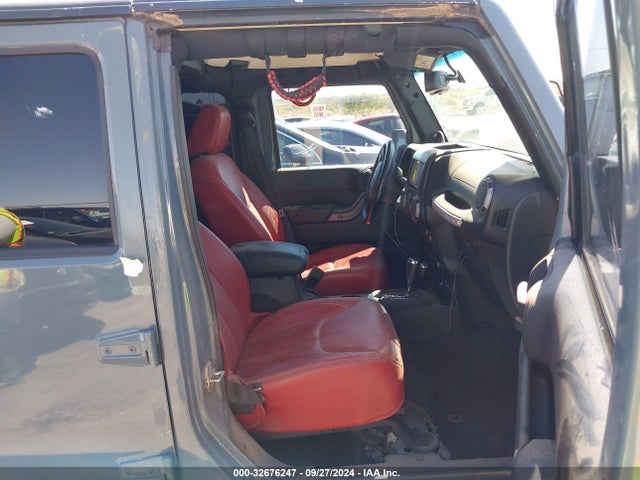 1C4HJWDG3EL144559 Jeep Wrangler Unlimited Sport
