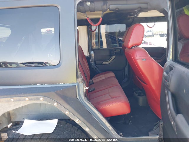 1C4HJWDG3EL144559 Jeep Wrangler Unlimited Sport