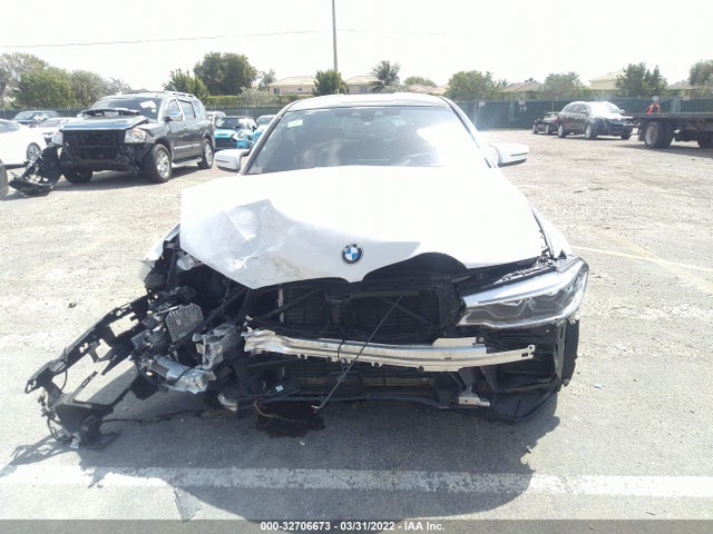 2018 BMW M5, VIN: WBSJF0C56JB283884