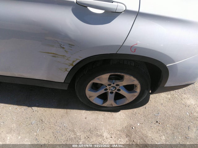 2014 BMW X1, VIN: WBAVM1C55EVW52370