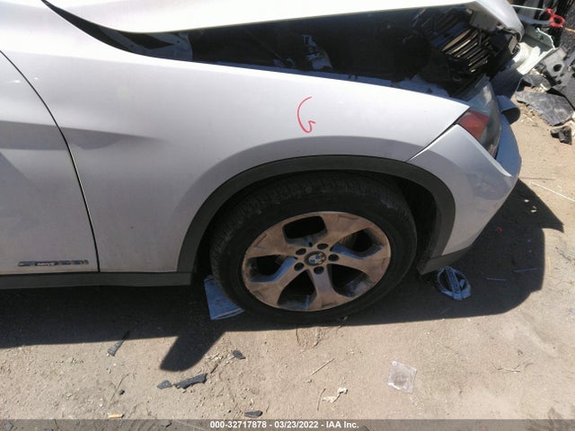 2014 BMW X1, VIN: WBAVM1C55EVW52370