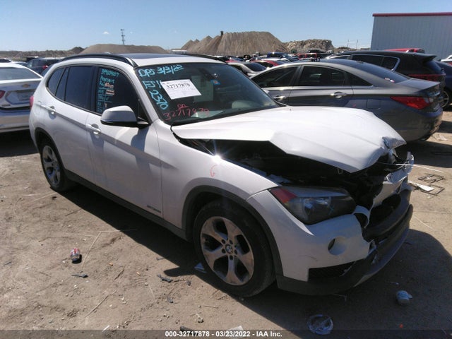 2014 BMW X1, VIN: WBAVM1C55EVW52370