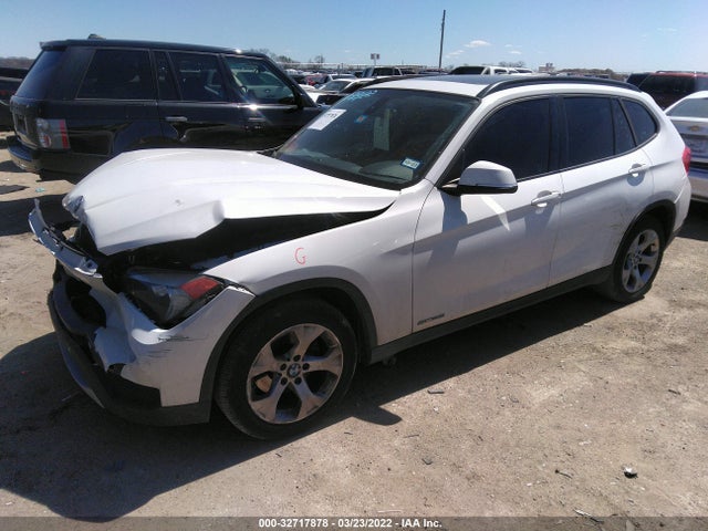 2014 BMW X1, VIN: WBAVM1C55EVW52370