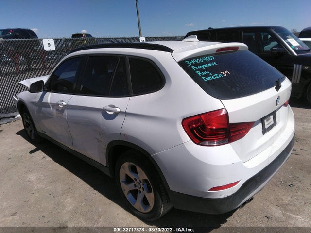 2014 BMW X1, VIN: WBAVM1C55EVW52370
