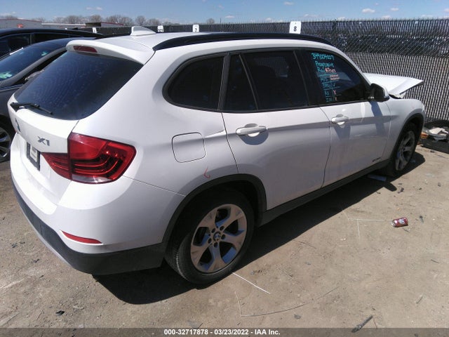 2014 BMW X1, VIN: WBAVM1C55EVW52370