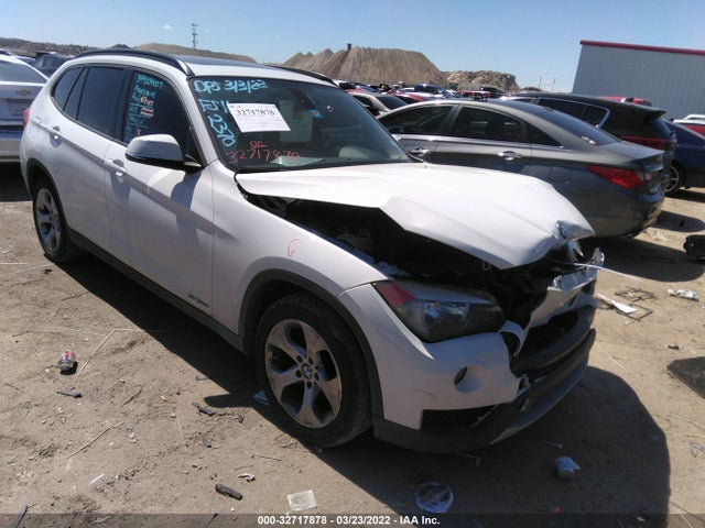 2014 BMW X1, VIN: WBAVM1C55EVW52370