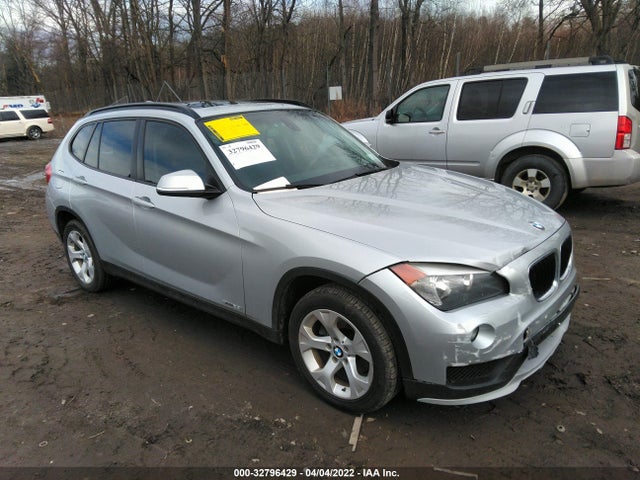 2015 BMW X1, VIN: WBAVM1C50FVZ94424