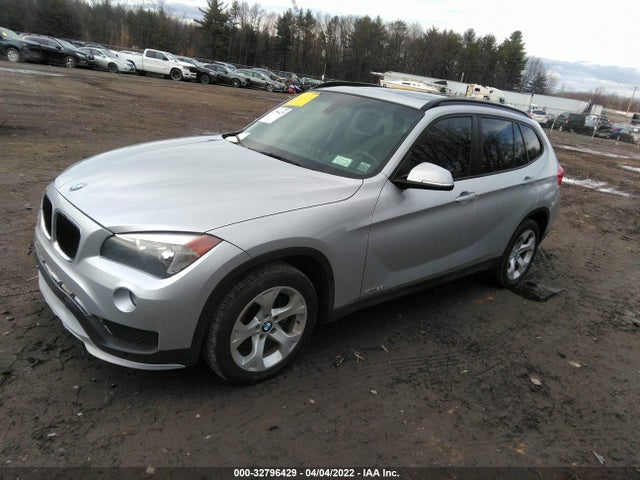 2015 BMW X1, VIN: WBAVM1C50FVZ94424
