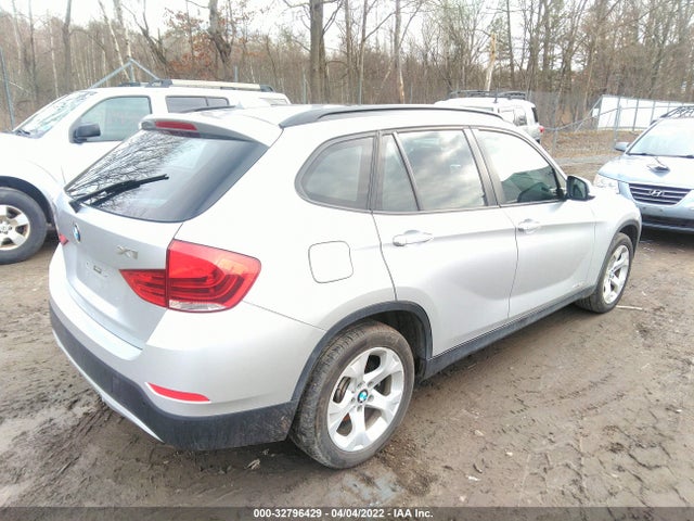 2015 BMW X1, VIN: WBAVM1C50FVZ94424