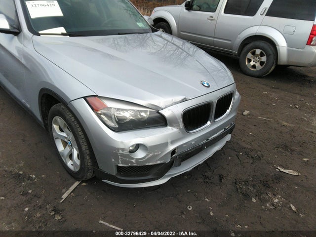 2015 BMW X1, VIN: WBAVM1C50FVZ94424