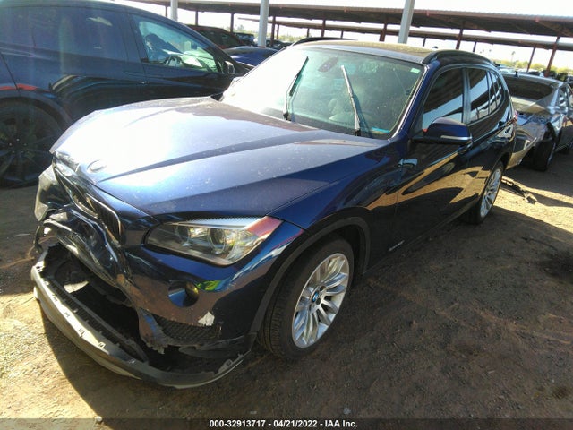 2015 BMW X1, VIN: WBAVM1C56FVW58485