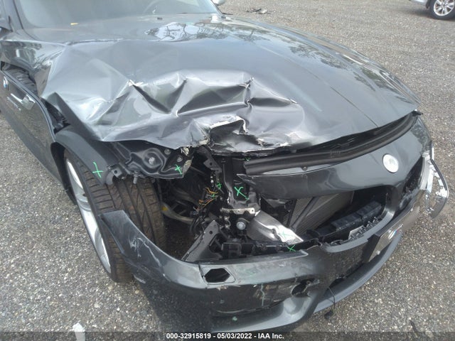 2015 BMW Z4, VIN: WBALM1C52FE634398