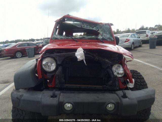 1C4BJWDG6EL106958 Jeep Wrangler Unlimited Sport