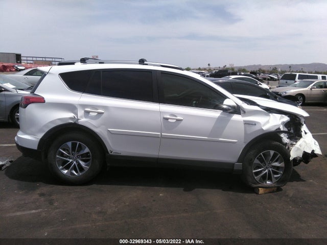 2018 Toyota RAV4, VIN: JTMRJREV2JD195896