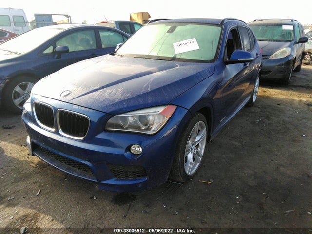 2014 BMW X1, VIN: WBAVM1C58EVW48698