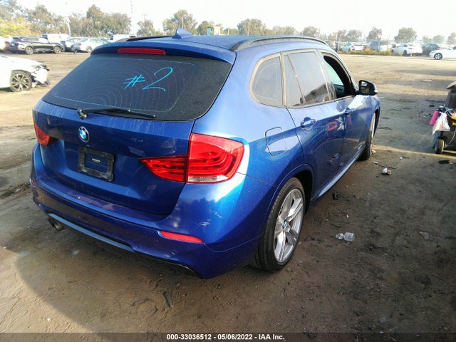2014 BMW X1, VIN: WBAVM1C58EVW48698
