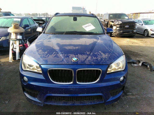 2014 BMW X1, VIN: WBAVM1C58EVW48698