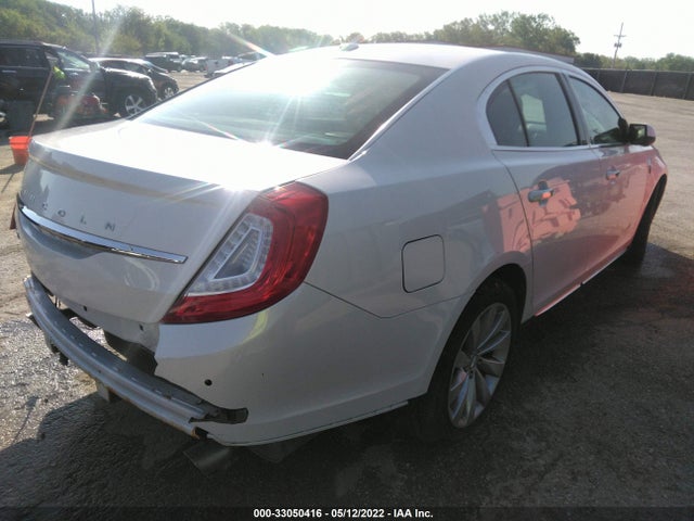 2016 Lincoln MKS, VIN: 1LNHL9DKXGG601021