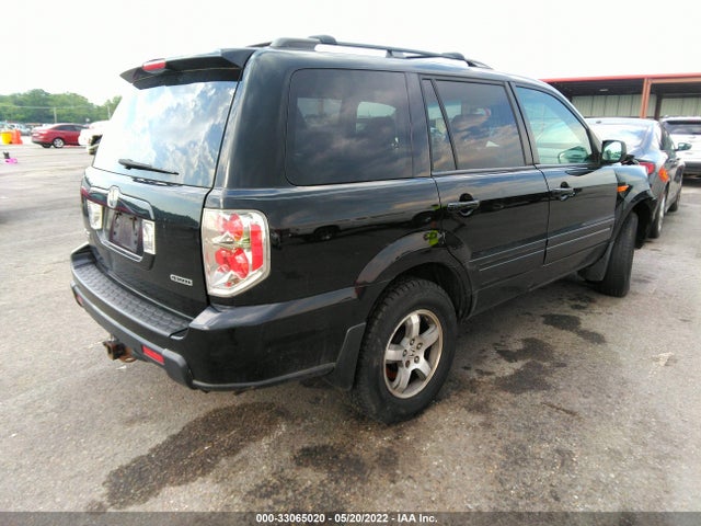 2007 HONDA PILOT EX-L VIN: 5FNYF18537B011383
