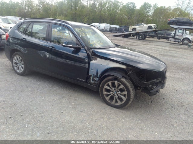 2014 BMW X1, VIN: WBAVL1C52EVY13759