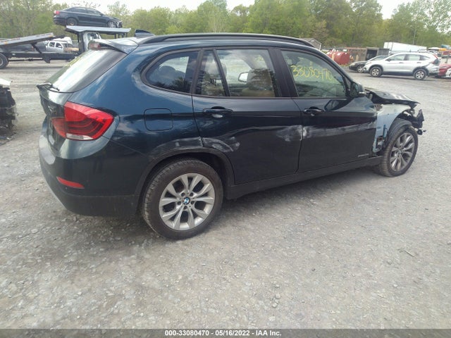 2014 BMW X1, VIN: WBAVL1C52EVY13759
