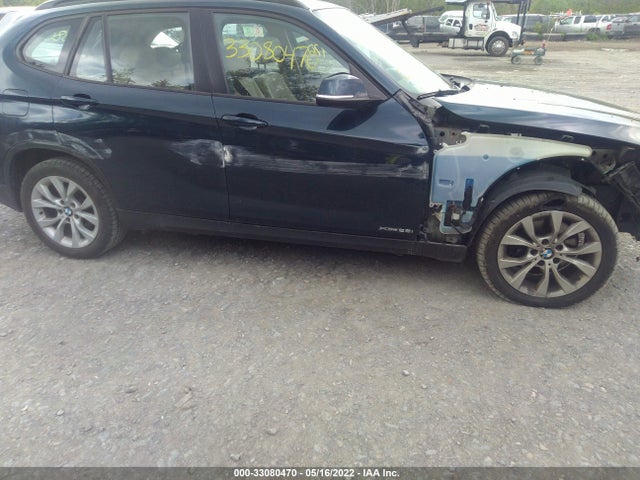 2014 BMW X1, VIN: WBAVL1C52EVY13759