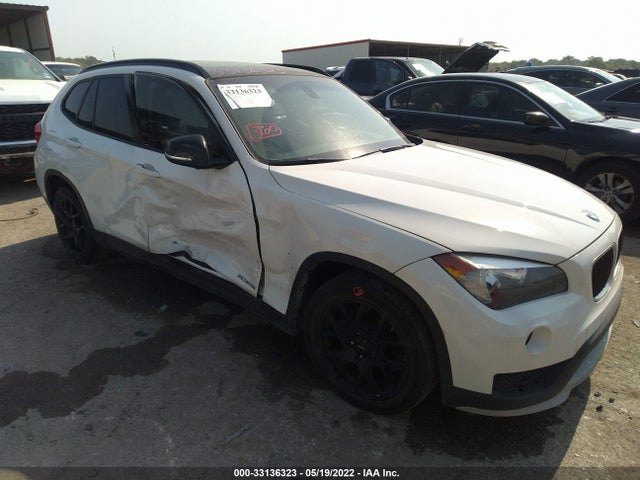 2015 BMW X1, VIN: WBAVM1C5XFV318756