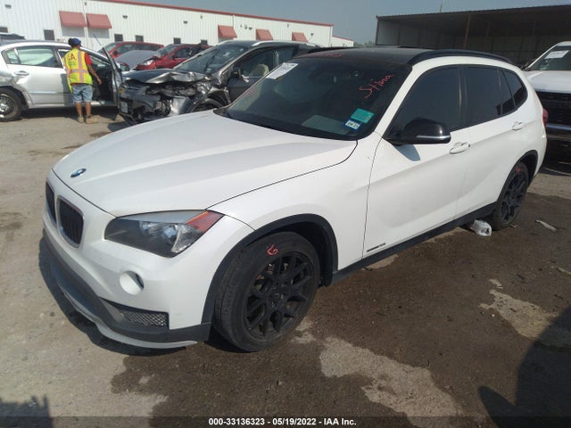 2015 BMW X1, VIN: WBAVM1C5XFV318756