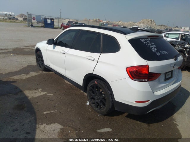 2015 BMW X1, VIN: WBAVM1C5XFV318756