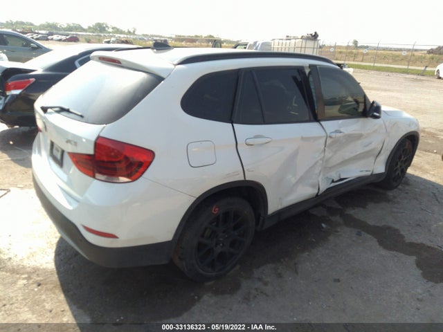 2015 BMW X1, VIN: WBAVM1C5XFV318756