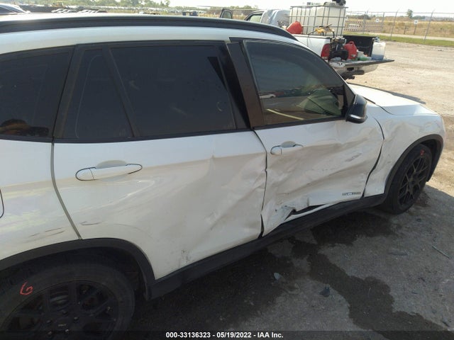 2015 BMW X1, VIN: WBAVM1C5XFV318756