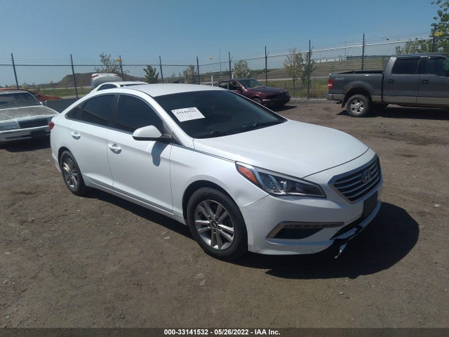 2015 5NPE24AF2FH133638 main image