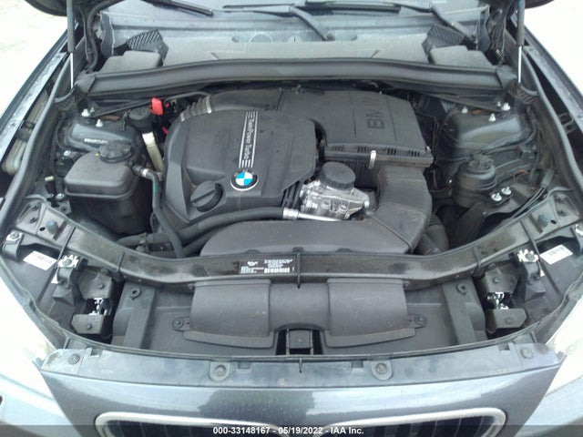 2014 BMW X1, VIN: WBAVM5C54EVV92671