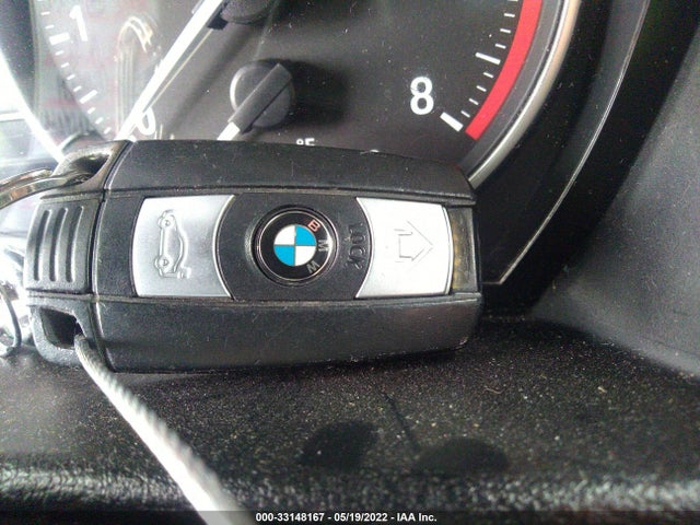 2014 BMW X1, VIN: WBAVM5C54EVV92671